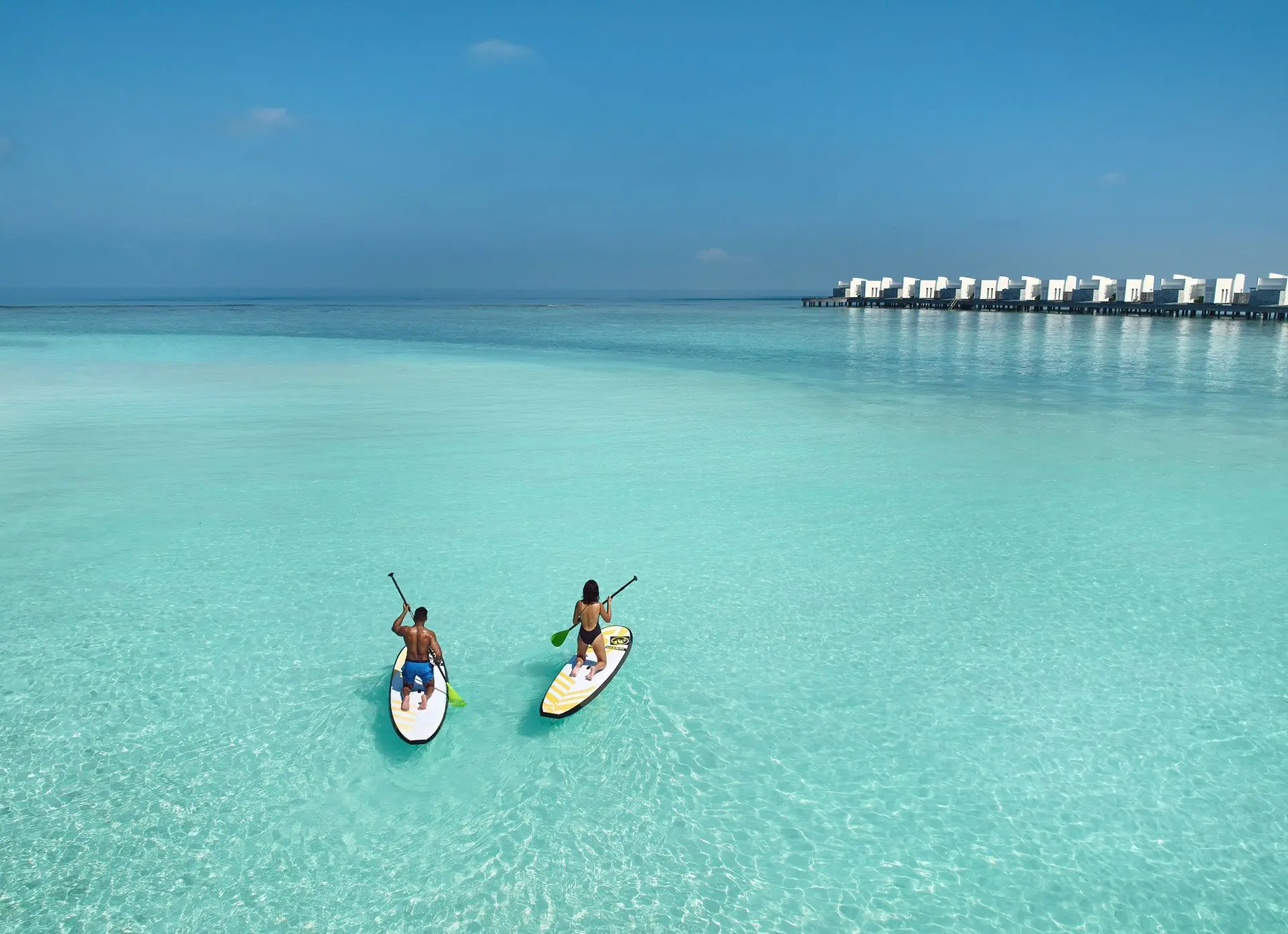 High_resolution_300dpi-Jumeirah Maldives - Standup paddle boarding couple