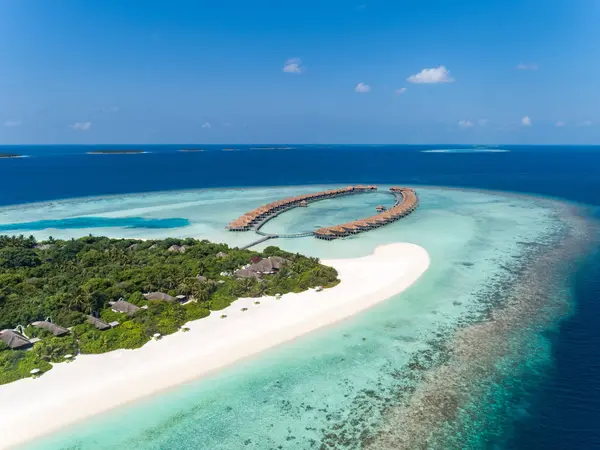 Anantara Kihavah Sunrise Over Water Villa Aerial
