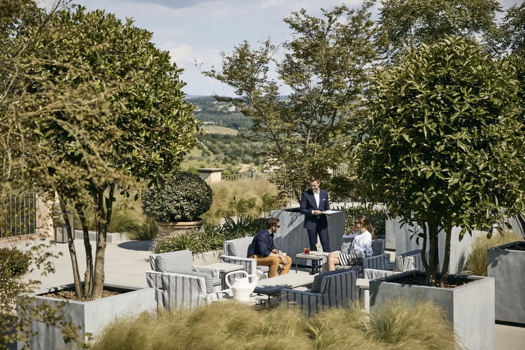 MM_21_Relaxing on Panoramic Terrace_Served Refreshments