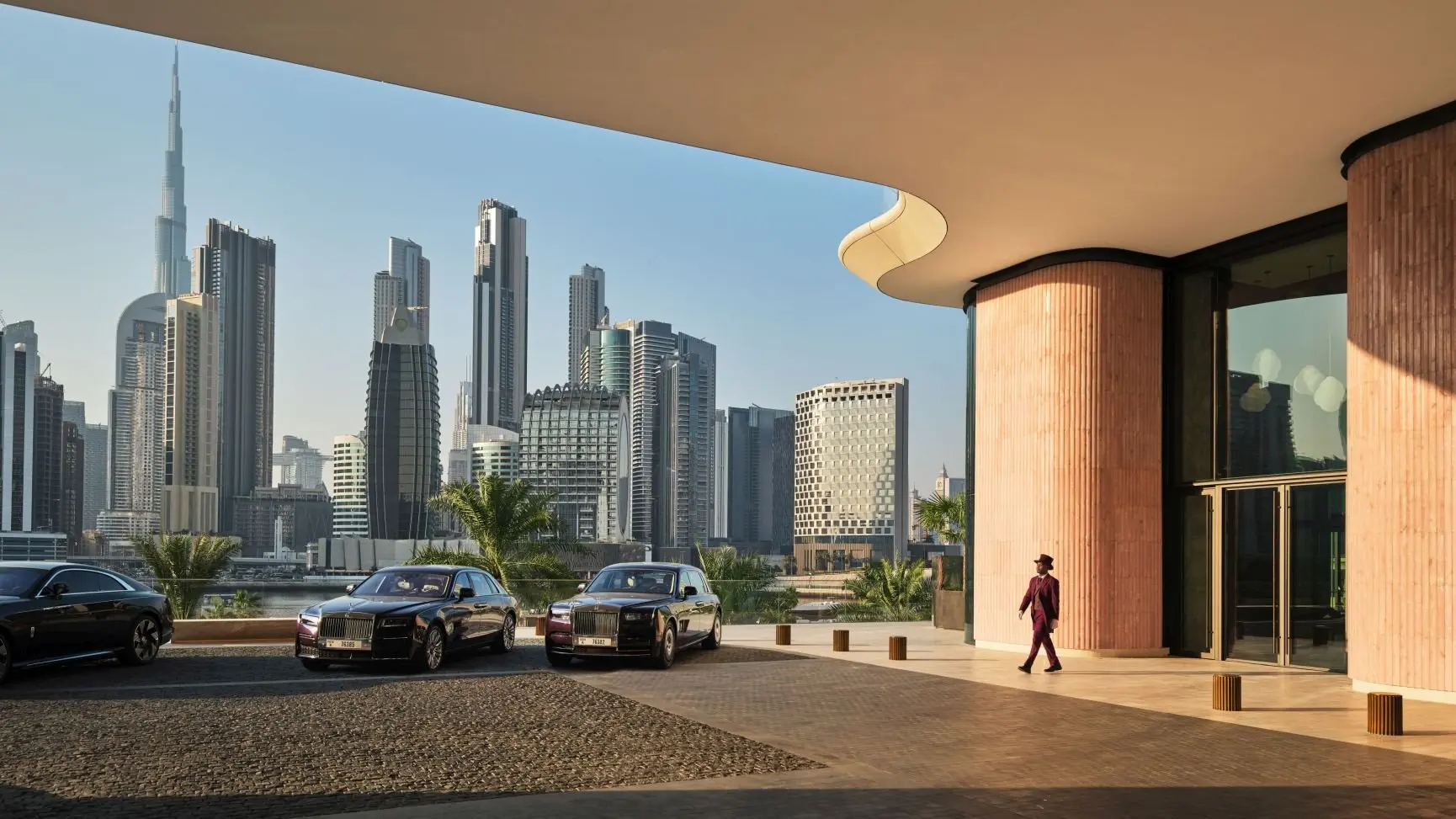 The Lana-Entrance _ view-doorman walking-rolls-DorchesterCollection