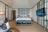 KagiMaldives_OceanPoolVillaBedroomInterior_1