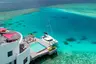 01_Three-Bedroom-Water-Retreat-Aerial-with-Catamaran_edit